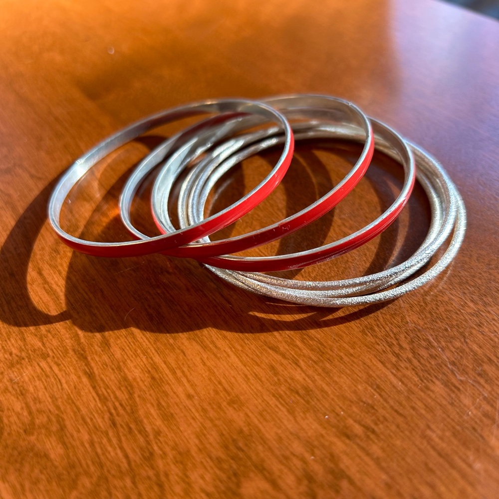 Silver and red bangles one size!